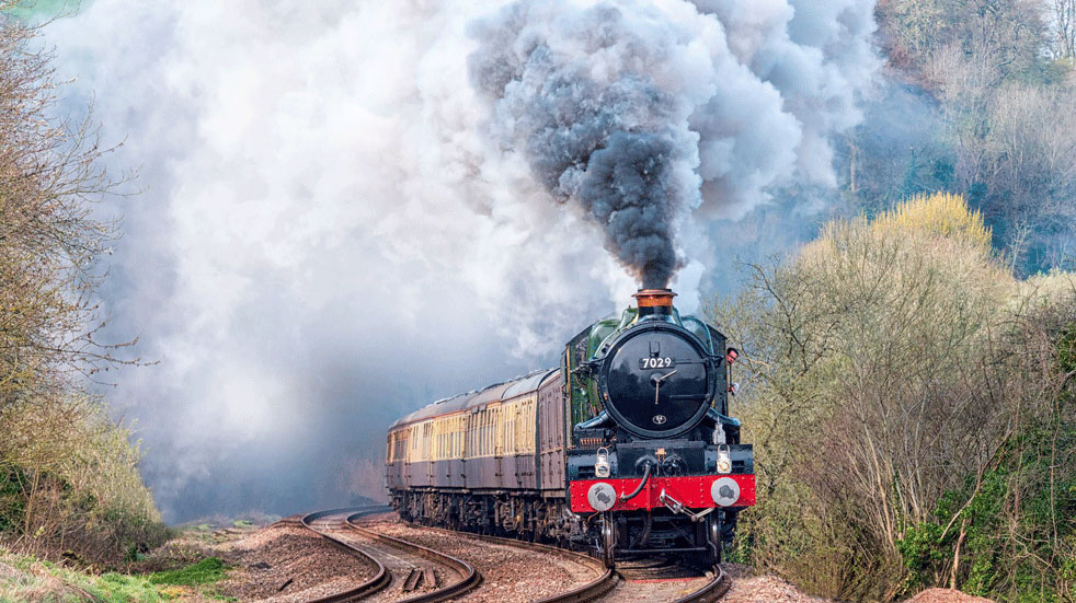 Vintage Trains operates a fleet of steam locomotives offering meals at a table of white napery, silver and glass